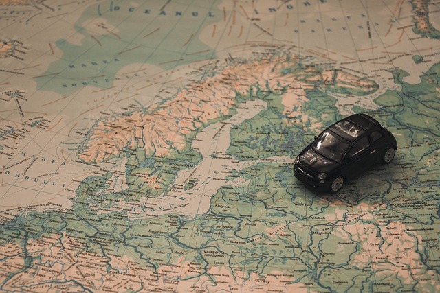 A small toy car placed on a map.